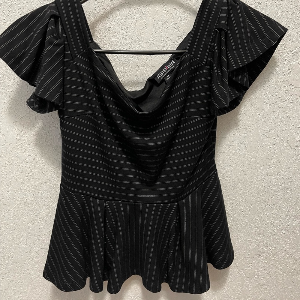 Never worn, a little tight for me in the breast area but super soft